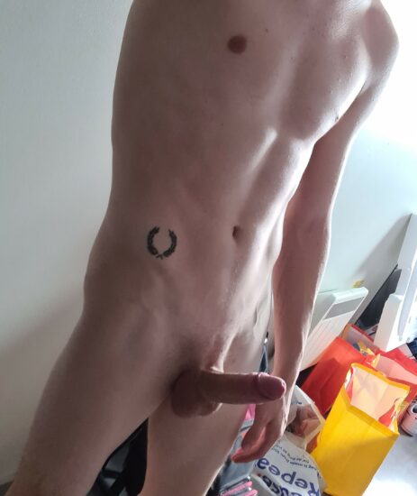 Smooth shaved erected penis