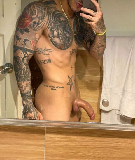 Tattooed nude guy